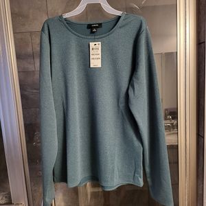Brand New, never worn, Women's teal with sparkle accents; size Med.